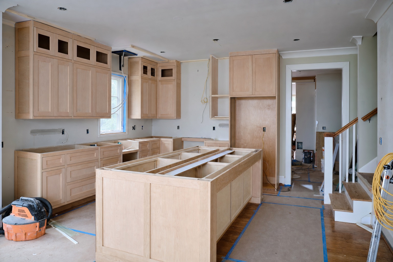 Bright open-concept kitchen connecting to living space in a Northern Virginia home by Valor Builder