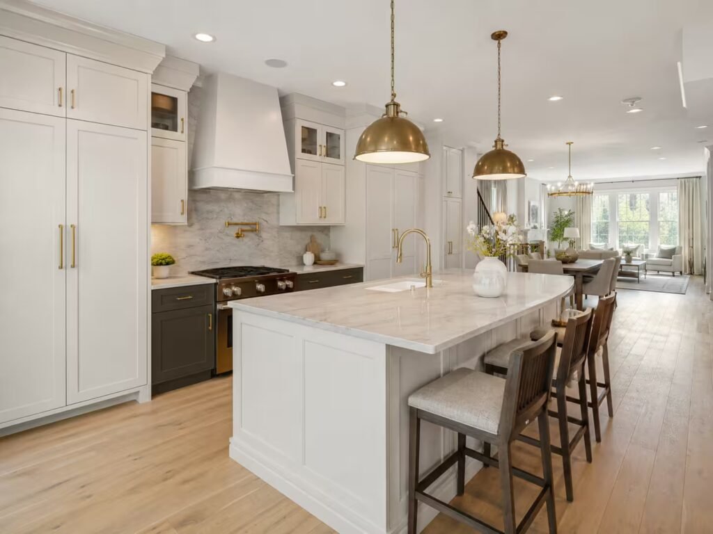 Open-concept townhome kitchen remodel with quartz island in Shirlington