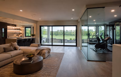 Finished walk-out lower level with golf view in a Lowes Island home